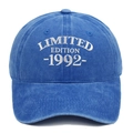 Detailed close-up of 1992 LIMITED EDITION white embroidery on vintage washed blue cotton cap - Sapphire Blue