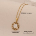 Gold stainless steel necklace with round shell pendant and starburst pattern detail - Round Style