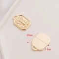 Macro detail of 14K gold plated 3D rose pendants for DIY jewelry with 20x14mm dimensions - 14K Bee