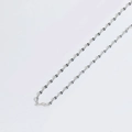 Silver O-chain necklace with minimalist dark blue enamel beads on white background - Water Ripple Chain / Silver