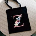 Black canvas tote bag with letter Z and pink floral roses print for stylish daily use - Letter Z / Black