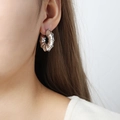 Boucle d'oreille spirale torsadée argentée au style industriel et minimaliste - Couleur Acier
