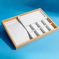 Bamboo jewelry organizer tray with white microfiber lining and multi-slot ring display - Three-Use Tray
