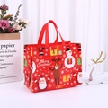 Red Christmas non-woven gift bag featuring Santa and reindeer with Merry Christmas text - 32*25*17cm / Christmas Red
