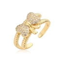 Elegante anello a fiocco dorato con micro-pavé di zirconi e fascia intrecciata - Stile CE00845YH / Oro