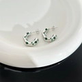 Polished silver C-shaped hoop earrings with emerald green zircon stones in a tray - Silver Green Zircon (DEP668)