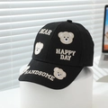 Detailed view of kids bear embroidery on black cotton baseball cap with happy text - 52-54cm (3-8 Years) / Black