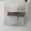 Set di quattro fermagli per capelli in metallo dorato con strass trasparenti - Set da 4 pezzi / Oro rosa
