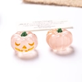 Glow-in-the-dark pink resin Halloween pumpkin ornaments with Jack-o'-lantern face - Luminous Pink Pumpkin Orange Eyes / 3D Detail