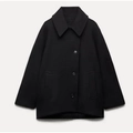 Detail of single-breasted wool jacket showing lapels and buttons on a black coat - XS / Black