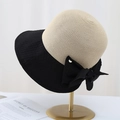 Elegant wide brim straw sun hat with black mesh bow on a golden display stand - M(56-58cm) / Black