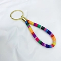 Ethnic bohemian woven keychain with colorful fabric wrist strap and golden metal ring - Rainbow Woven