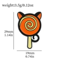 Lollipop cat enamel pin dimensions 29x19mm with orange and black Halloween design - Cat Ear Lollipop