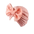Detail of pink ribbed baby turban hat featuring a large soft chiffon bow on front - Nude Pink