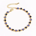 Close-up of gold evil eye heart charms and blue crystal links on jewelry chain - Blue Enamel Dark Blue Zircon Style (Gold 6)