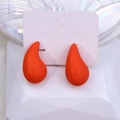 Minimalist orange matte teardrop acrylic earrings displayed on a white jewelry card - Orange