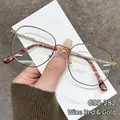 Klassisches Metall-Brillengestell in Weinrot-Gold für einen stilvollen, schlichten Look - Weinrot-Gold
