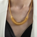 Chic gold-plated titanium steel necklace featuring a unique spiral spring pendant design - Gold (P1773)
