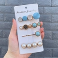 Detail of candy blue hair clip set featuring faux pearls and crystals on display card - Centennial Style (4 Piece Set)