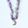Irregular amethyst stone necklace with a silver crescent moon face pendant - Amethyst Moon