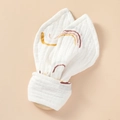 Organic wooden baby teether with white cotton rabbit ears and rainbow print pattern - Rainbow