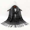 Soft black and grey plaid cashmere-like scarf with fringe details on a wooden hanger - Black Gray Plaid (YR109-01)