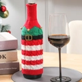Striped knit Christmas wine bottle cover with green trim, belt, and tiny golden bells - Red Green Striped Bell Belt Wine Bottle Cover