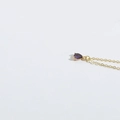 Minimalist golden necklace with purple waterdrop shaped gemstone pendant on white background - Purple (Gold) (XL3412)