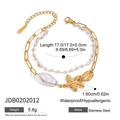 Détail de l'étoile de mer en or 18 carats et perle baroque sur bracelet en acier inoxydable - Bracelet Double Rang Perle Etoile de Mer (JDB0202012)