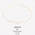 Cerchietto minimalista ondulato in metallo dorato con finitura lucida liscia - Onda morbida / Oro