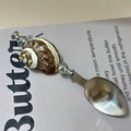Creative stainless steel stirring spoon featuring a natural brown spiral seashell handle - Striped Cat Eye Shell Spoon