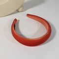 Close-up detail of the plush red velvet texture on this wide sponge padded headband - Orange
