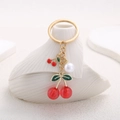 Golden cherry pearl keychain featuring red translucent cherries and white pearl accents - ER709-Gold Red Cherry