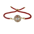 Adjustable red woven Evil Eye bracelet with colorful cubic zirconia in gold plating - Braided Rope Style / Red