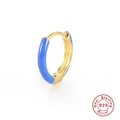 Macro detail of S925 sterling silver gold-plated hinged hoop earring with blue enamel - Gold-Light Blue