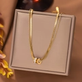 Golden double-layer titanium steel necklace with sparkling rhinestone interlocking rings - Transfer Ring / Gold