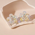 Close-up of aurora glass flower earrings with iridescent crystal petals on a plaster base - Yellow-Blue Floral (Silver Pin)