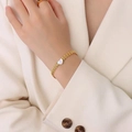 Elegante bracciale dorato con madreperla a cuore e maglia con trama a spiga di grano - Stile Intarsio Cuore (5177) / 5177 Bracciale a Spiga