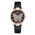 Close-up of women's quartz watch featuring a glitter butterfly dial and leather strap - Black