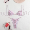 Detail of pink floral bikini with gold ring buckle and metallic chain side straps - White with Pink Flowers