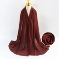 Maroon bubble chiffon headscarf on mannequin with close-up of soft fabric texture - Red Brown