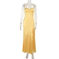 Detail of elegant yellow satin dress featuring a high side slit and refined draping fabric - S / Yellow