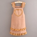 Pink orange apron with white polka dots and ruffle edges and heart-shaped chest detail - Canvas Heart Ruffles - Khaki Dots