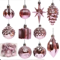 Pink Christmas ornament set with assorted metallic baubles, stars, and pinecones - Pink
