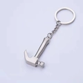 Mini silver metal hammer keychain with polished finish and sturdy keyring for daily use - Claw Hammer