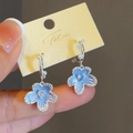 Elegant gold earrings featuring light blue flower petals with heart-shaped zircon and pearls - Pearl Circle Blue Flower Earrings
