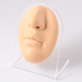 Flesh-colored silicone nose and mouth piercing model on a transparent acrylic stand - Nude-Face with Stand
