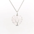 Detail of silver wire wrapped pink rose quartz heart tree of life pendant on a silver chain - Silver & White Crystal
