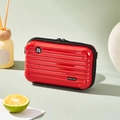 Portable red hard-shell crossbody cosmetic bag with ribbed texture and strap - Red
