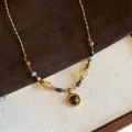 Detail of beaded necklace featuring tiger eye pendant and multi-color stones on woven cord - Gold Retro Multi-ore Beaded (35#)